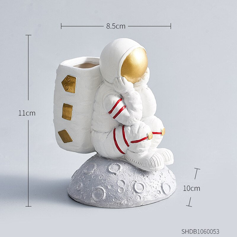 Astronaut Pen Statue