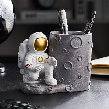 Astronaut Pen Statue